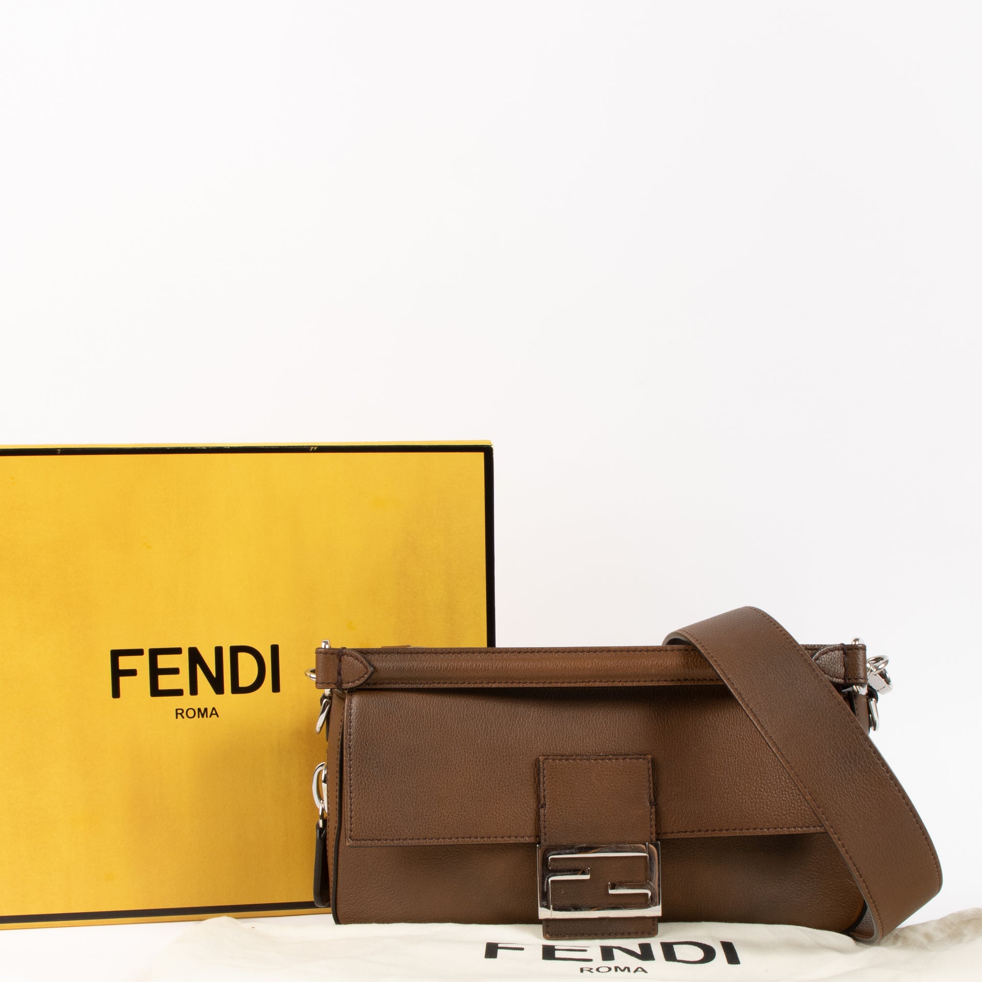 The Fendi Brown Leather Zipped Baguette Bag on Labellov.com !