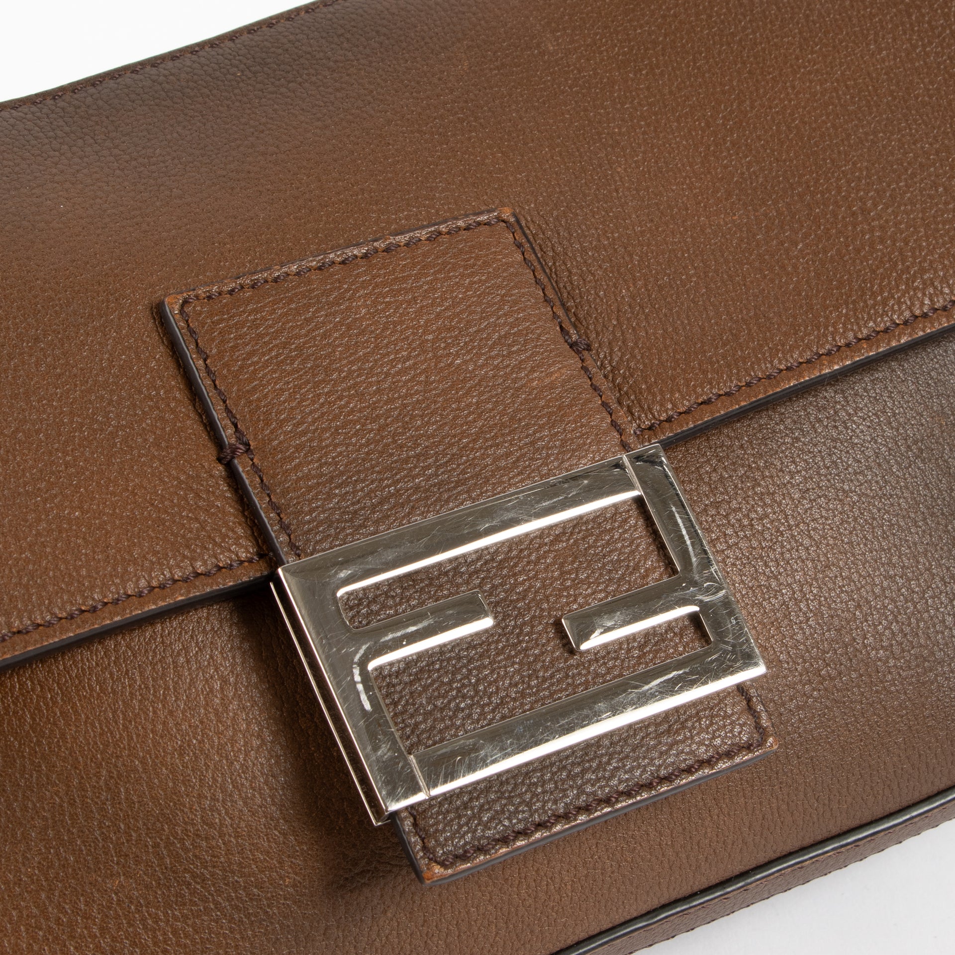 The Fendi Brown Leather Zipped Baguette Bag on Labellov.com !
