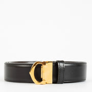 Authentic Cartier black leather belt with gold C buckle, measuring 117 cm, available at Labellov.com.