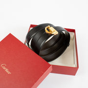 Authentic Cartier black leather belt with gold C buckle, measuring 117 cm, available at Labellov.com.