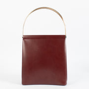 Authentic Cartier Burgundy Trinity Bag with gold handle at Labellov.com