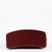 Authentic Cartier Burgundy Trinity Bag with gold handle at Labellov.com