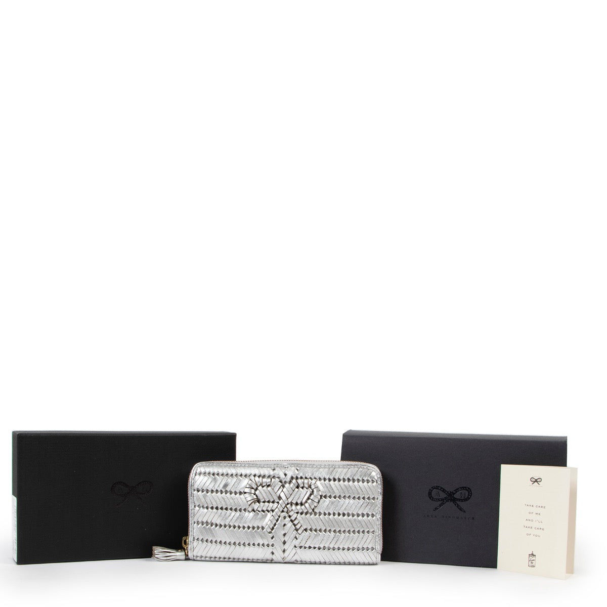 Shop safe online at LABELLOV in Antwerp this 100% authentic second hand Anya Hindmarch Silver Wallet