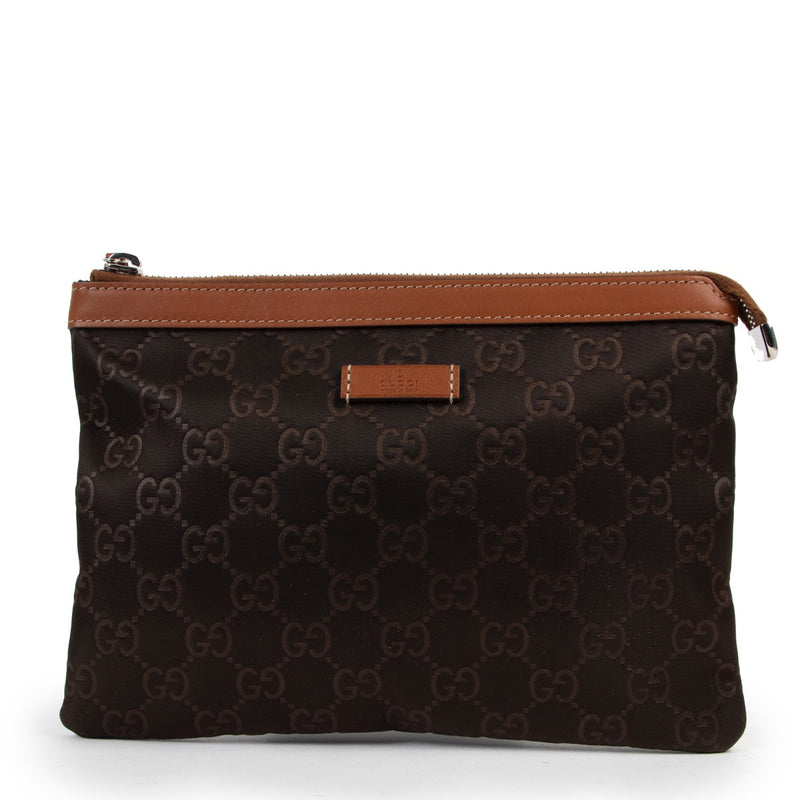 Buy an authentic second hand Gucci Brown Nylon Clutch Pouch at Labellov