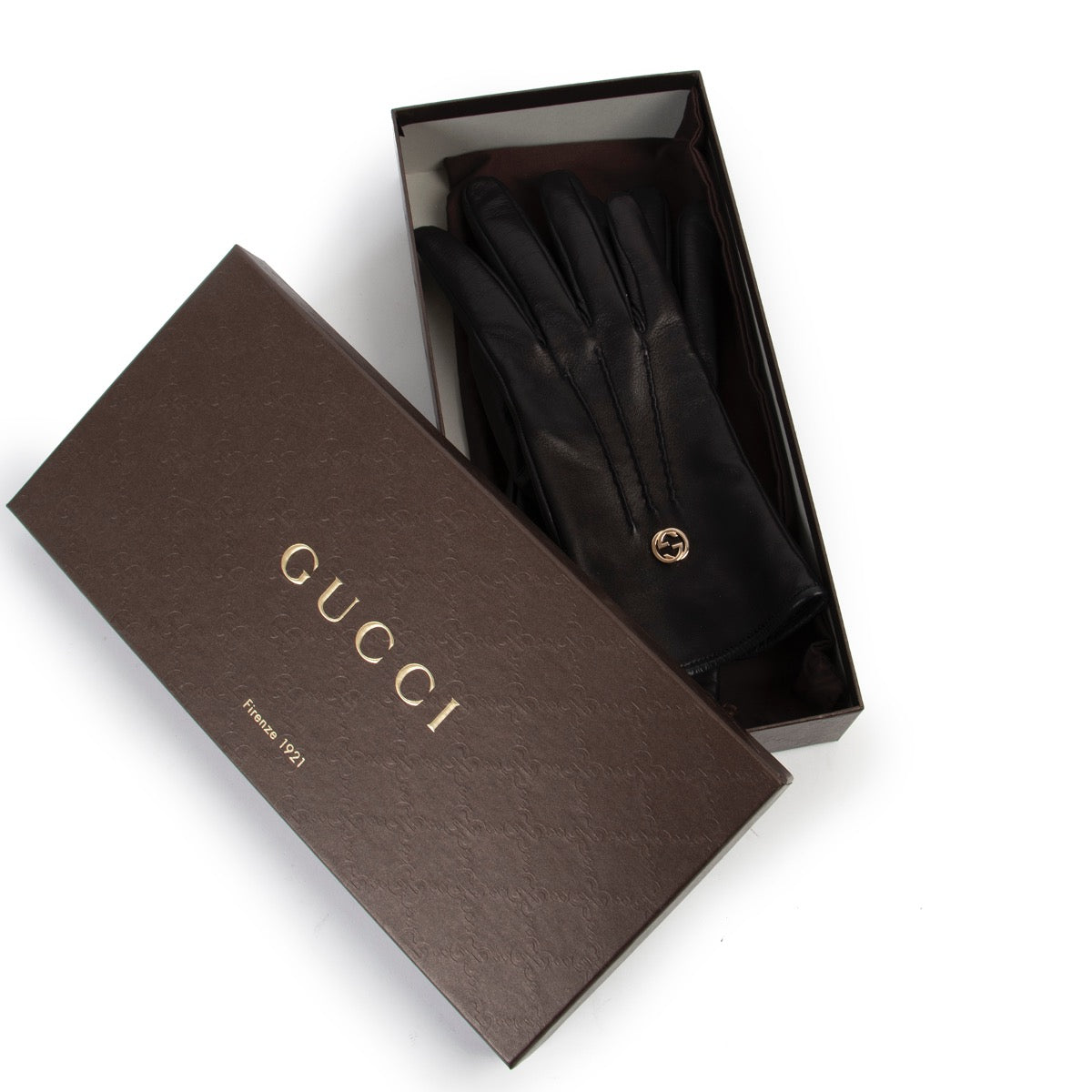 Buy an authentic pair of second hand Gucci black leather logo gloves at Labellov