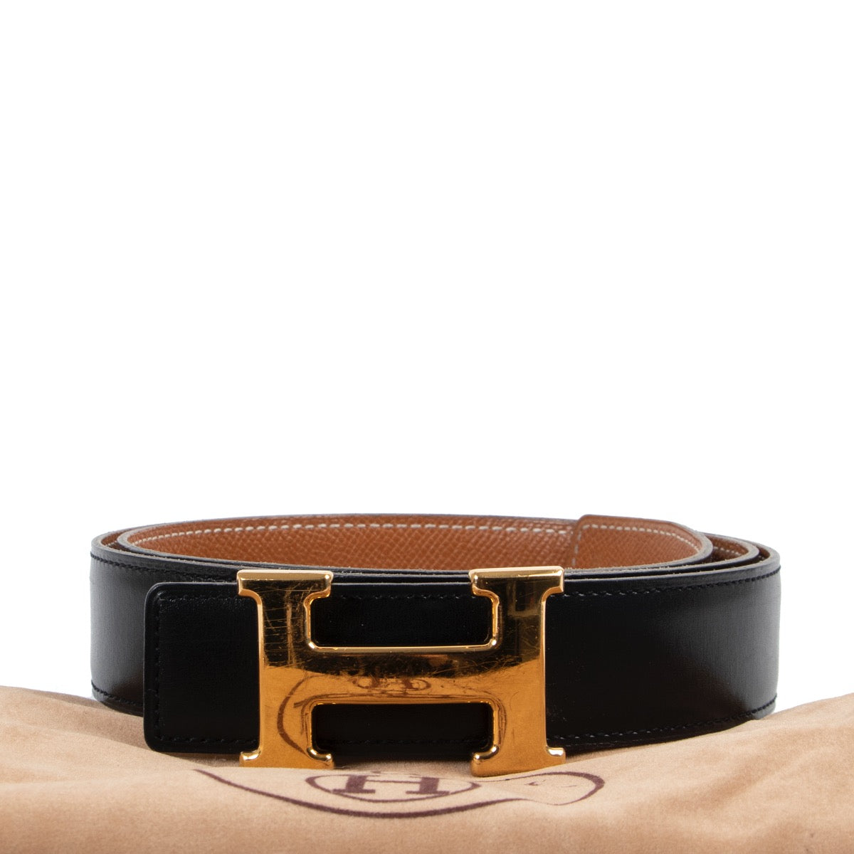 Buy online an authentic second hand Hermès black/brown reversible Constance belt in good condition at Labellov in Antwerp.