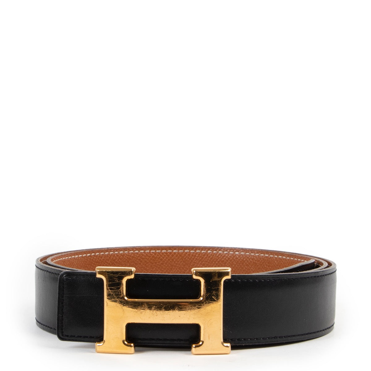 Buy online an authentic second hand Hermès black/brown reversible Constance belt in good condition at Labellov in Antwerp.
