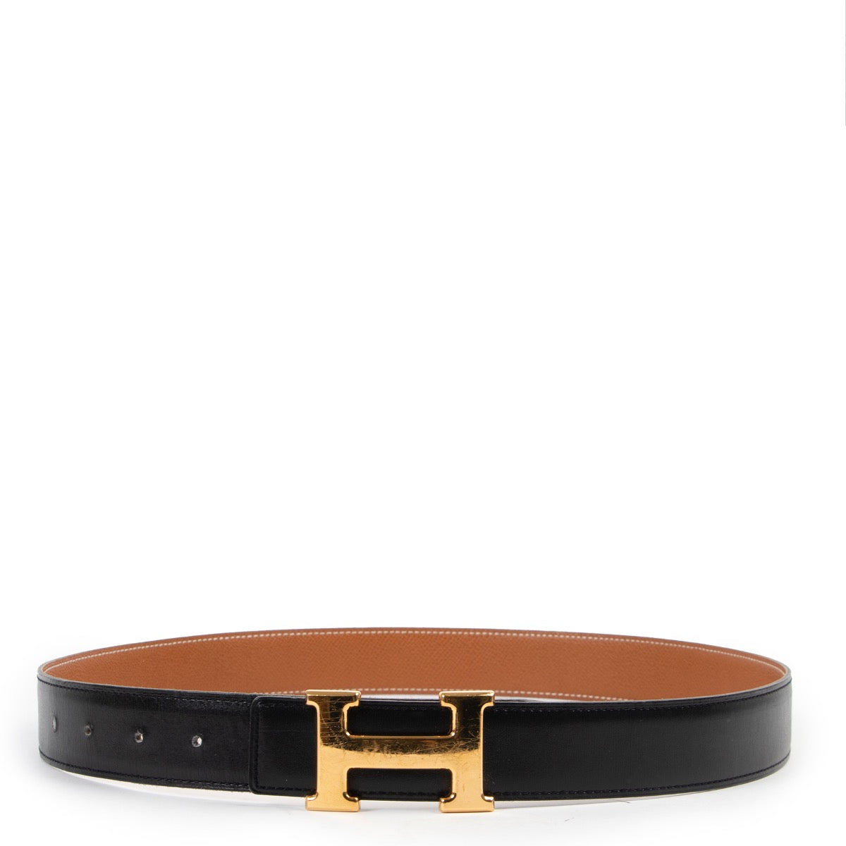 Buy online an authentic second hand Hermès black/brown reversible Constance belt in good condition at Labellov in Antwerp.