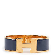 Hermès Clic H Blue Bracelet Buy this 100% authentic Hermès Masterpiece safely here.