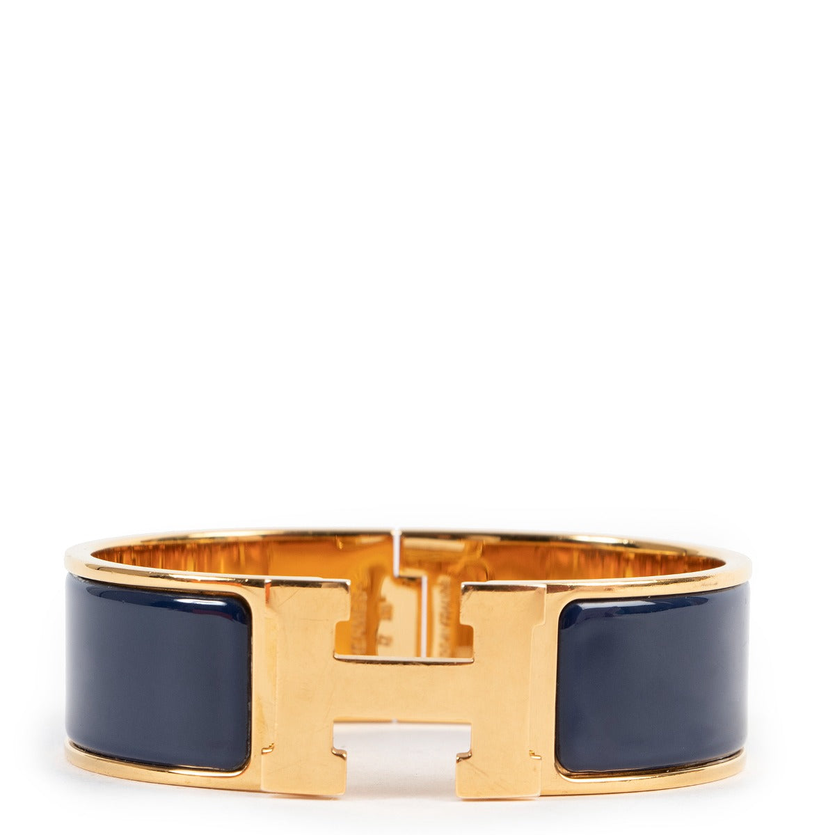 Hermès Clic H Blue Bracelet Buy this 100% authentic Hermès Masterpiece safely here.