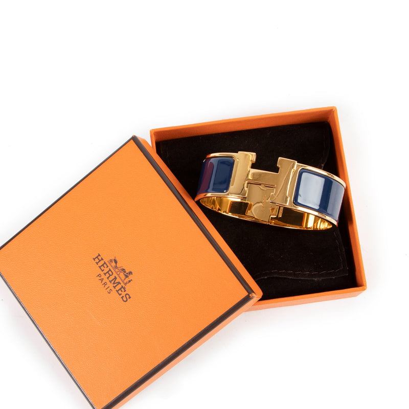 Hermès Clic H Blue Bracelet Buy this 100% authentic Hermès Masterpiece safely here.