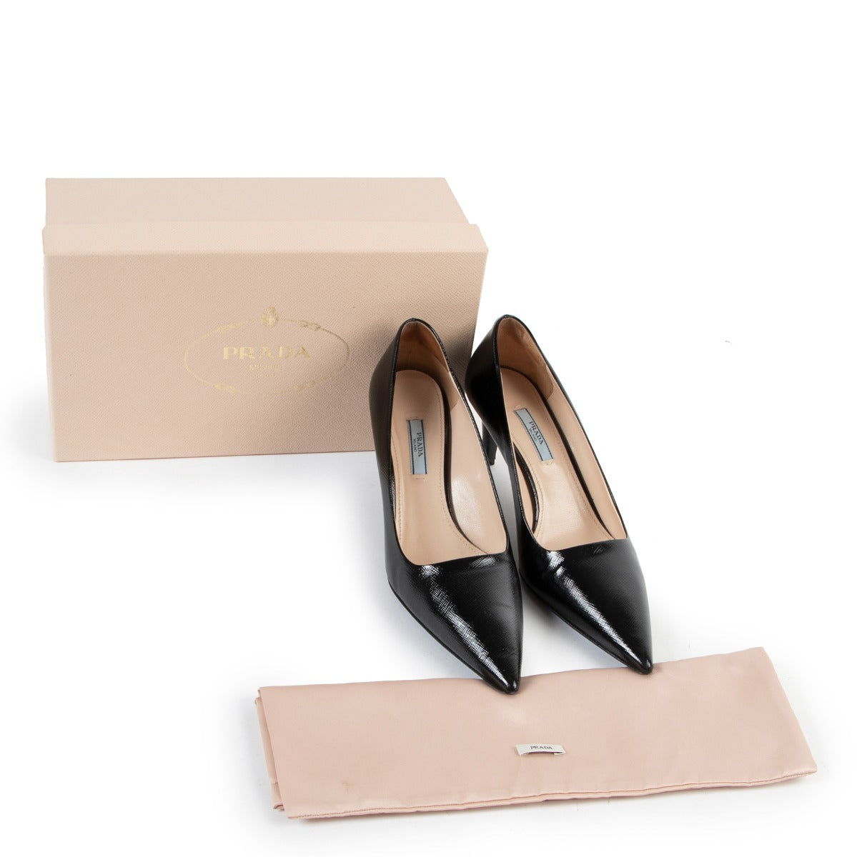 Prada Black Shiny Saffiano Patent Leather Pumps Buy these gorgeous Prada heels here safely