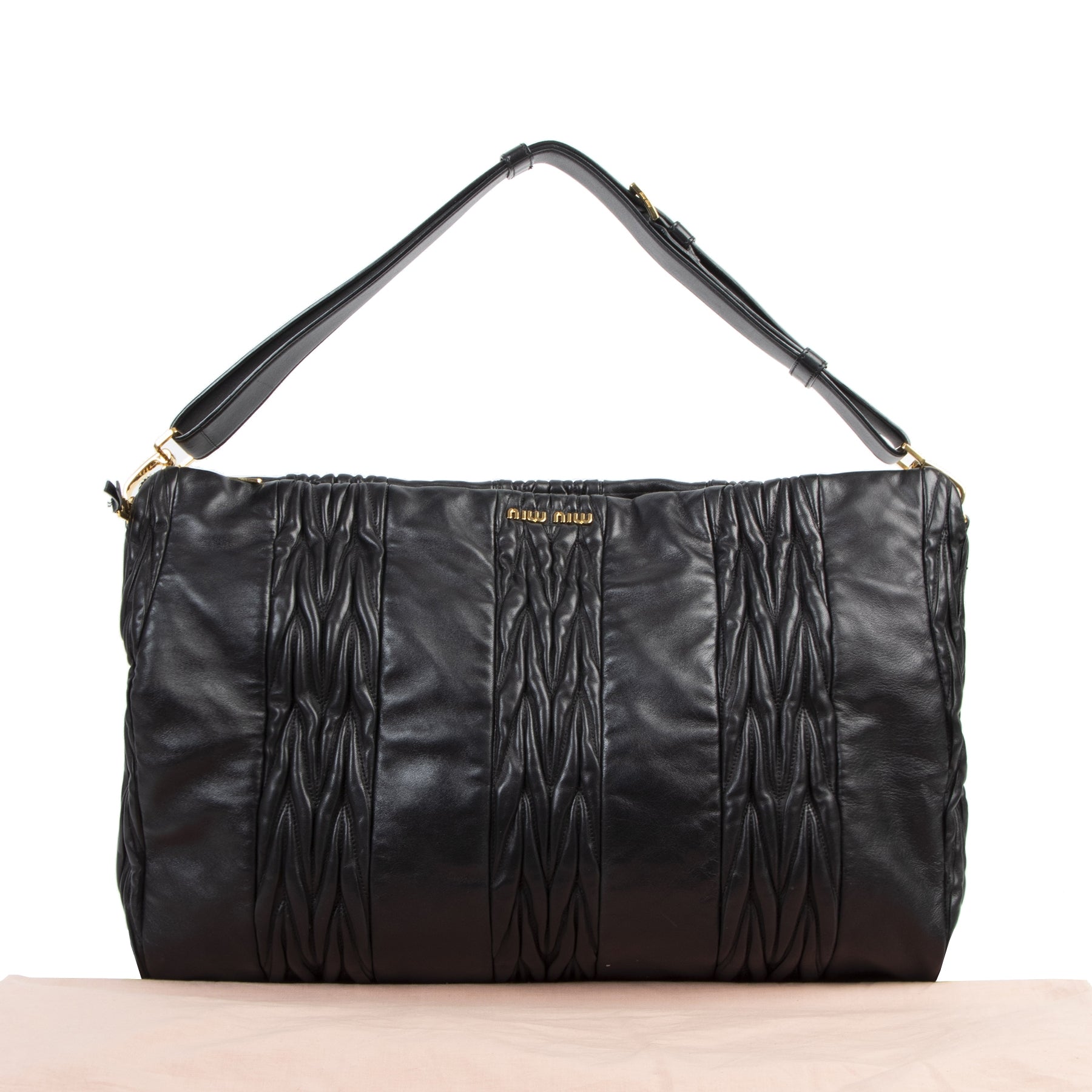 We buy and sell your authentic designer Miu Miu Black Sacca Matelassé Patch Bag for the best price