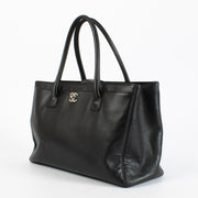Chanel Black Executive Shoulder Bag in smooth leather with silver-tone hardware, authenticity card, dust bag, and removable pouch available at Labellov.com
