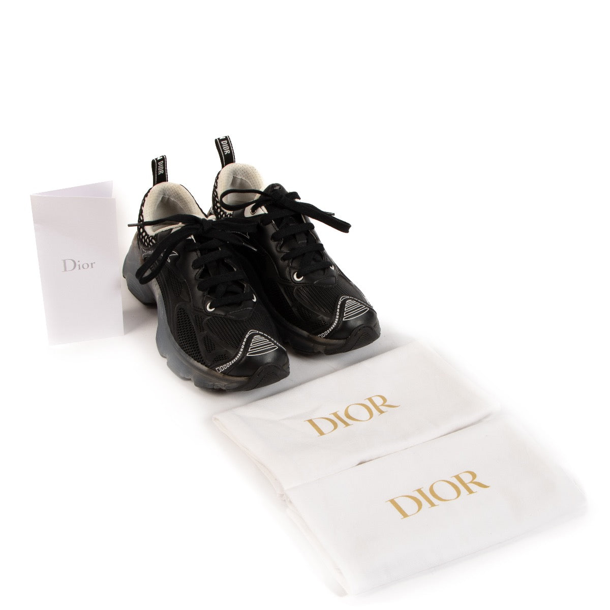 Buy real authentic Christian Dior Black Vibe Sneakers in very good condition safe online at labellov.com
