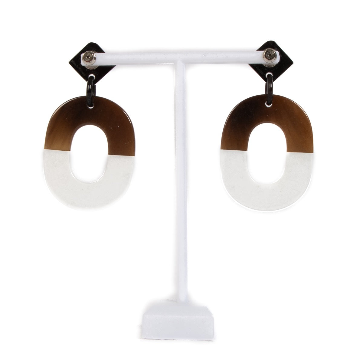 Shop 100% authentic second-hand Hermès Brown/White Horn Istheme Earrings on Labellov.com