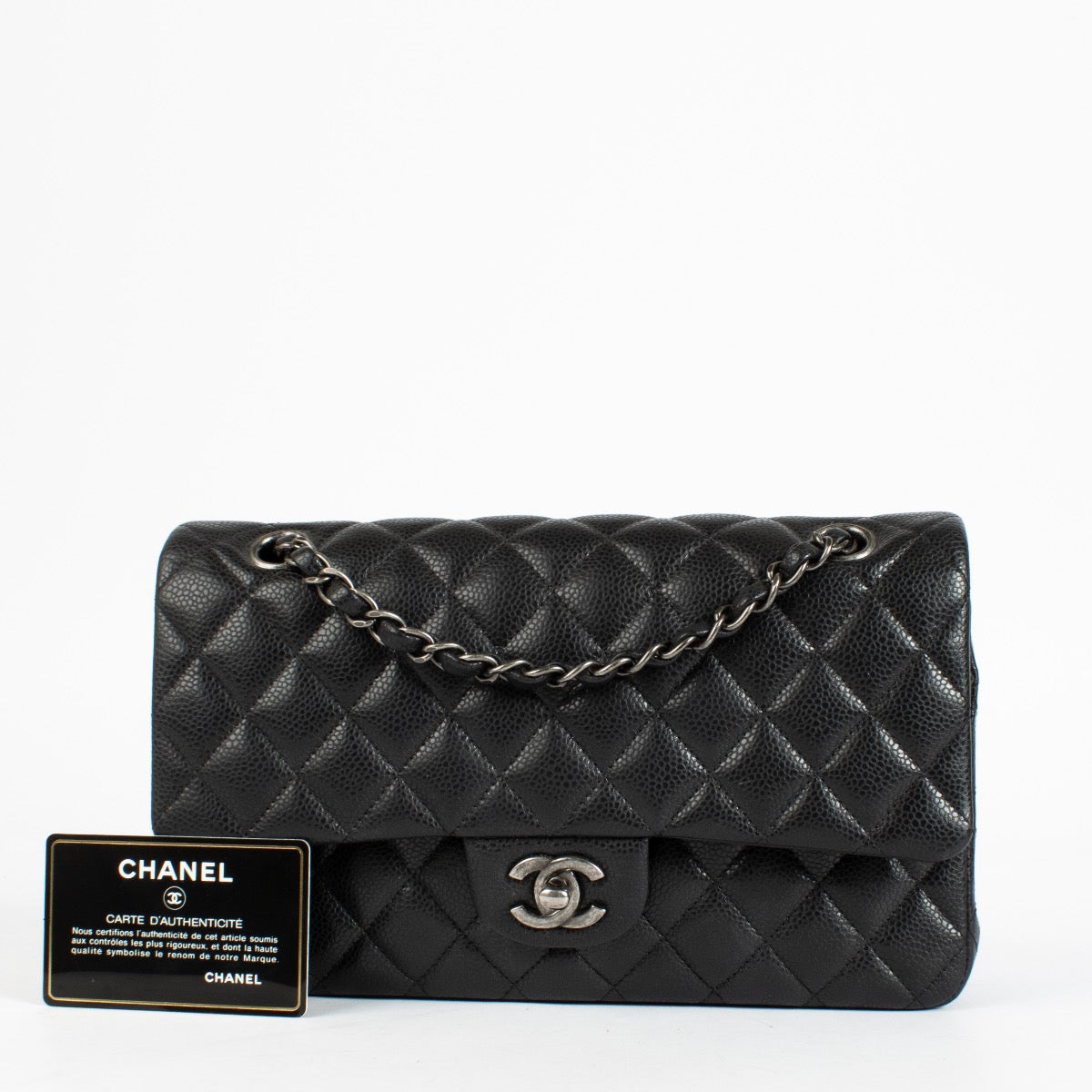 Authentic pre-loved Chanel Black Caviar Medium Classic 11.12 Handbag on Labellov.com
