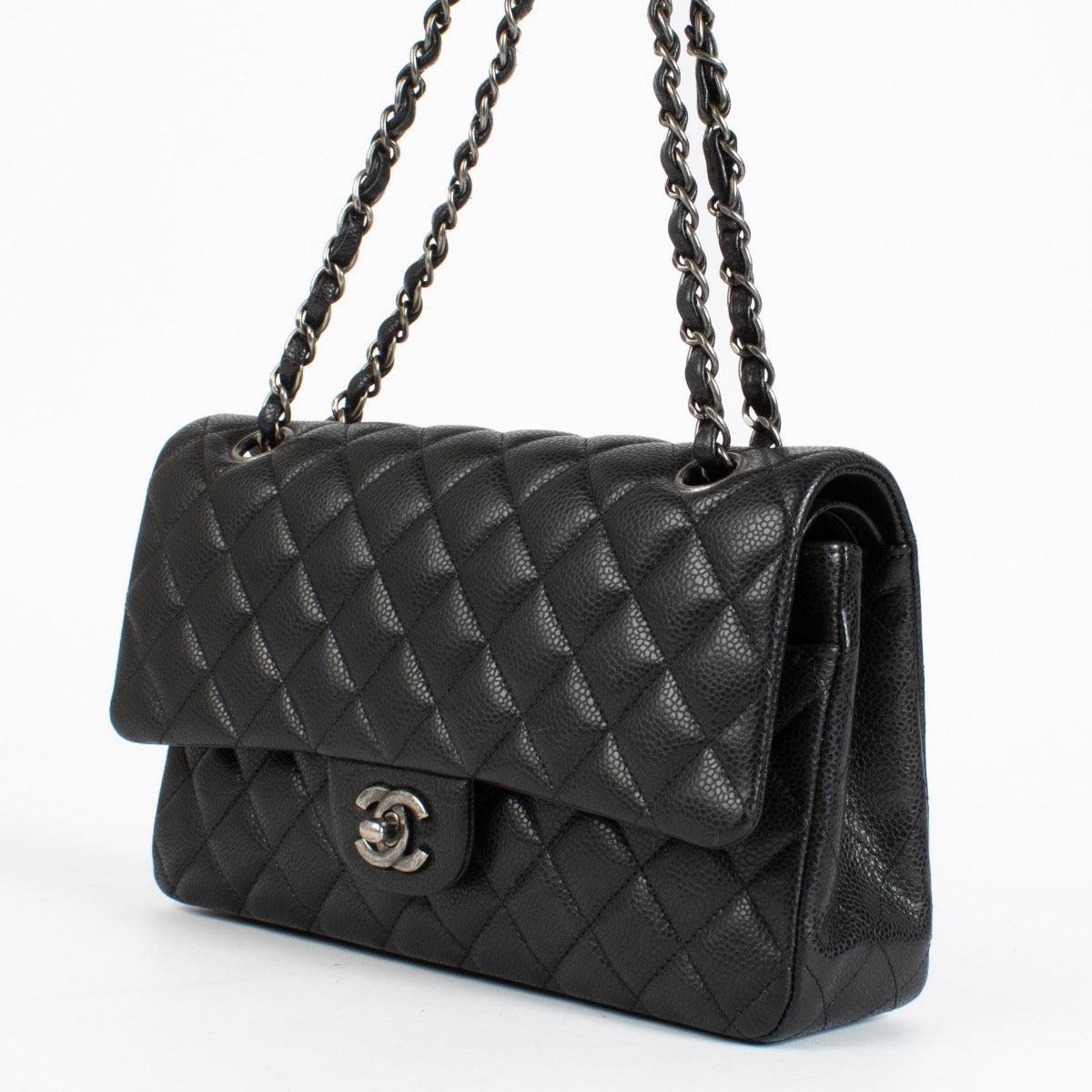 Authentic pre-loved Chanel Black Caviar Medium Classic 11.12 Handbag on Labellov.com