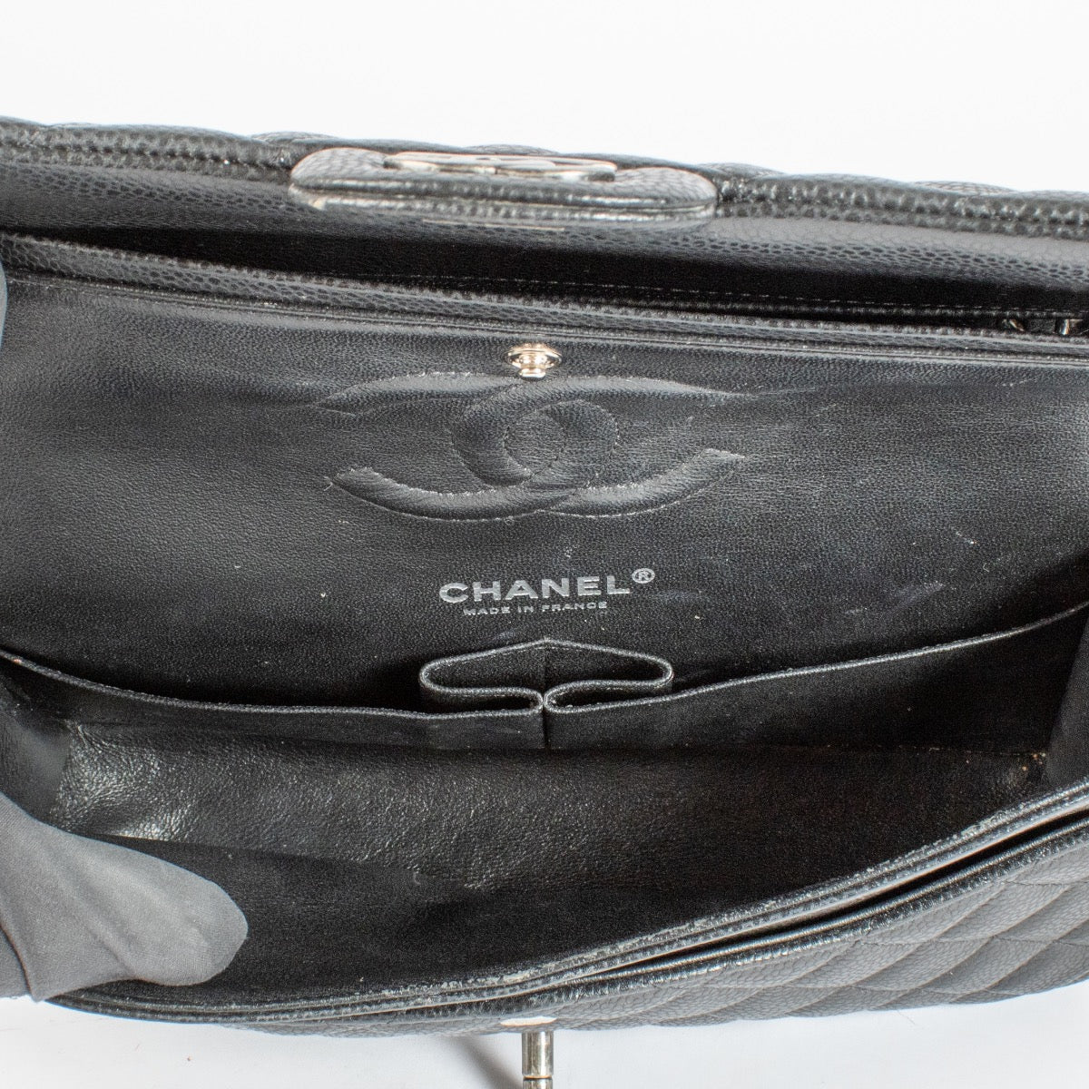 Authentic pre-loved Chanel Black Caviar Medium Classic 11.12 Handbag on Labellov.com