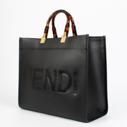 Authentic pre-loved Fendi Black Sunshine Medium Bag on Labellov.com