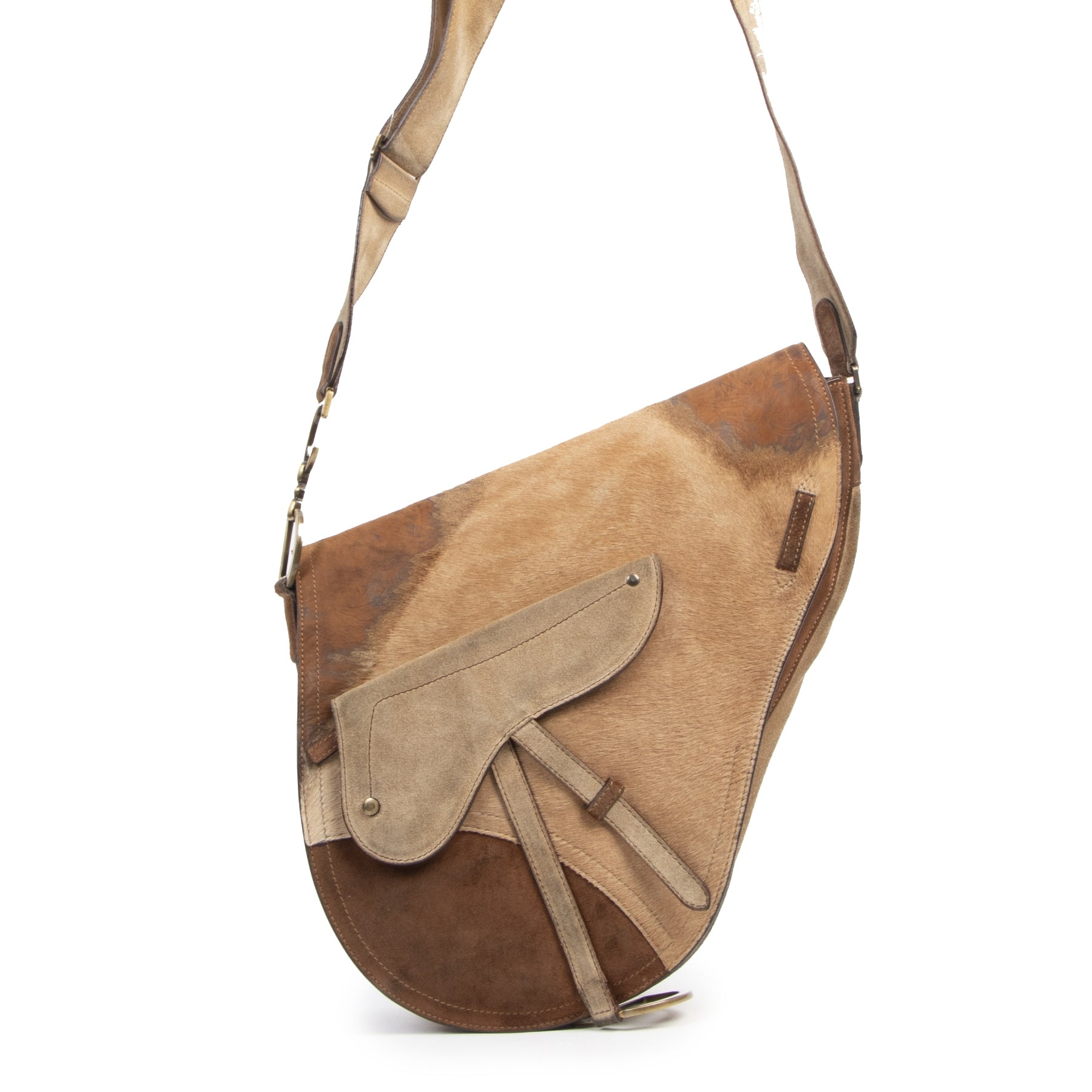 Buy authentic secondhand Christian Dior Pony Hair Large Saddle Crossbody Limited Edition at the right price at LabelLOV vintage webshop. Safe and secure online shopping. Koop authentieke twee