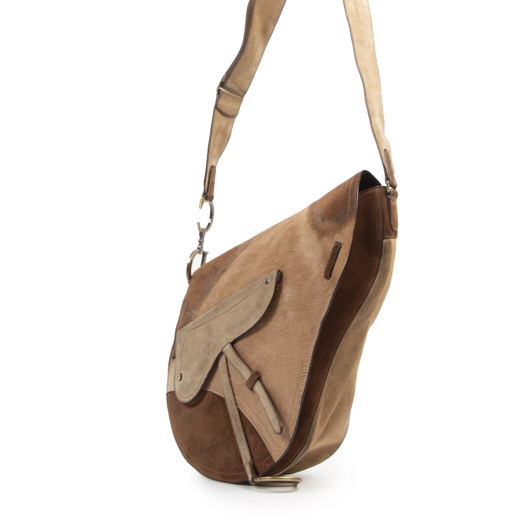 Buy authentic secondhand Christian Dior Pony Hair Large Saddle Crossbody Limited Edition at the right price at LabelLOV vintage webshop. Safe and secure online shopping. Koop authentieke twee