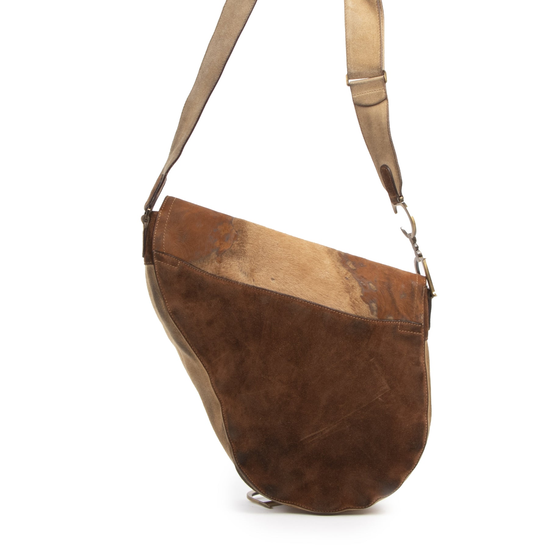 Buy authentic secondhand Christian Dior Pony Hair Large Saddle Crossbody Limited Edition at the right price at LabelLOV vintage webshop. Safe and secure online shopping. Koop authentieke twee