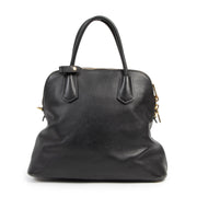 Buy authentic secondhand Prada Black Saffiano Leather Dome Top Handle Bags at the right price at LabelLOV vintage webshop. Safe and secure online shopping. Koop authentieke tweedehands Prada Black Saffiano
