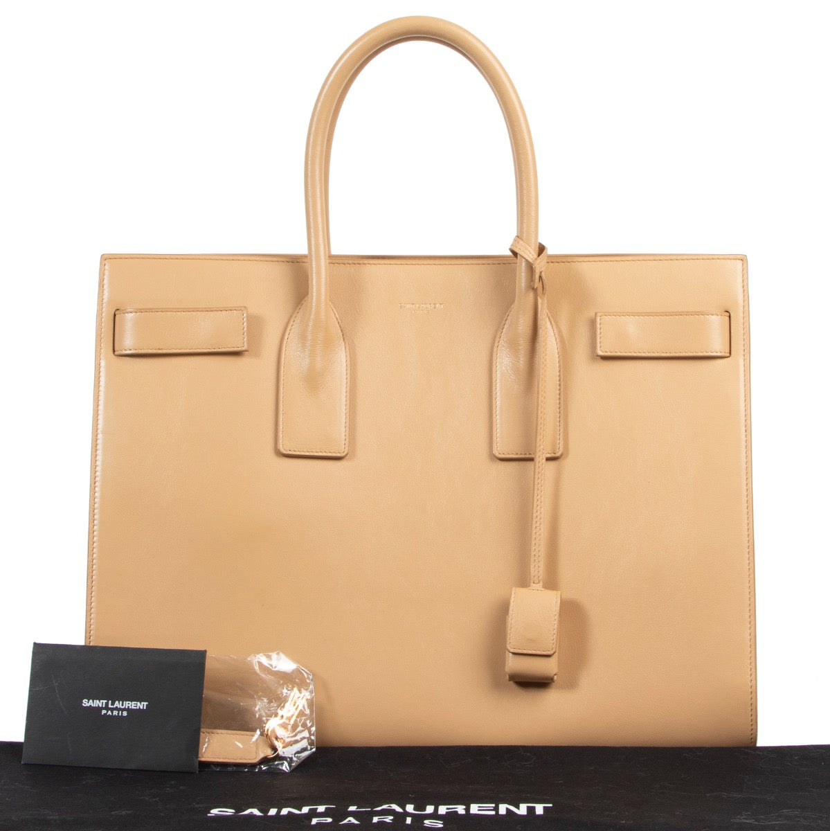 Buy authentic secondhand Saint Laurent Sac De Jour in beige leather at the right price at Labellov vintage webshop.