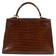Hermès Kelly 32 Miel Crocodile GHW te koop tweedehands met verzekerde verzending bij Labellov