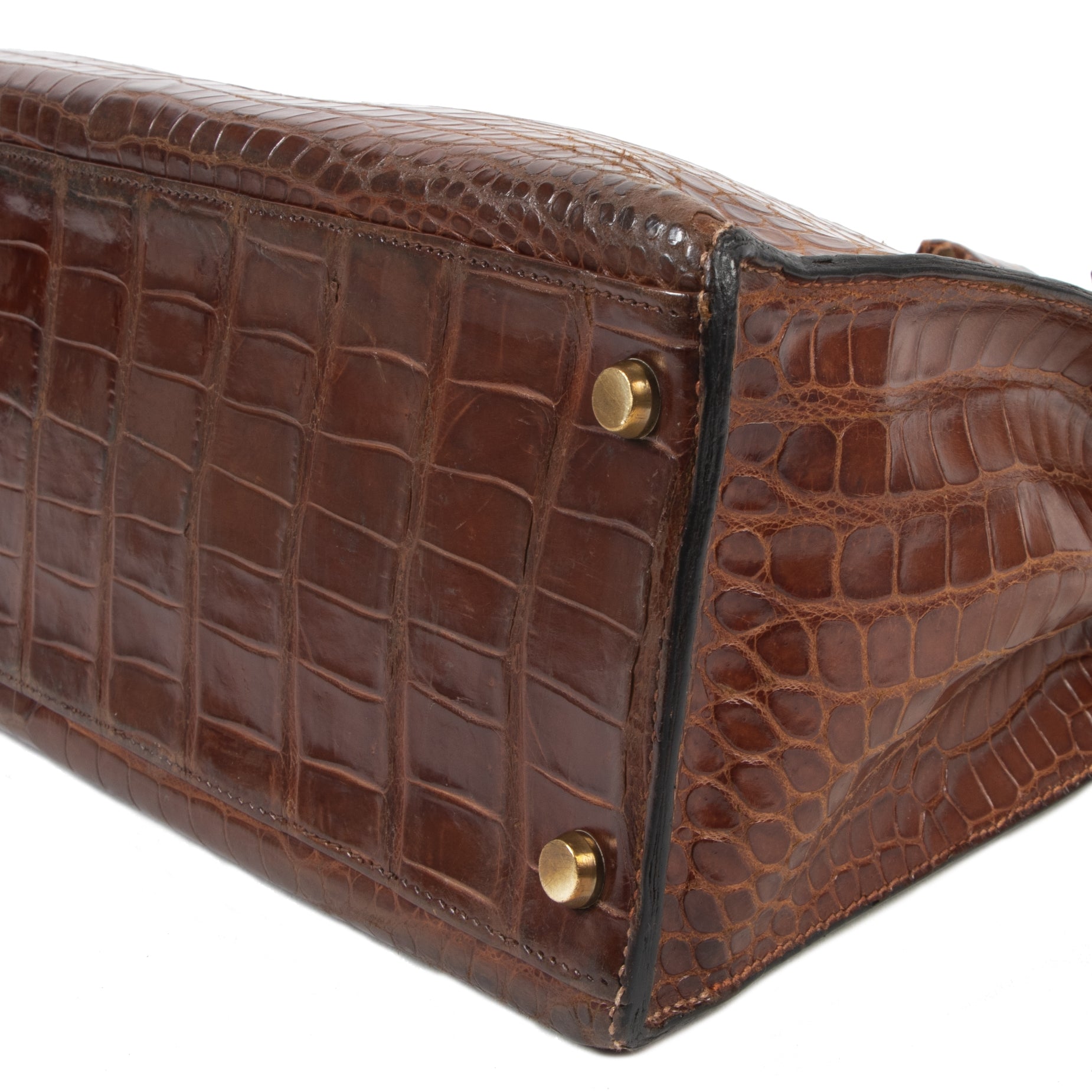 Hermès Kelly 32 Miel Crocodile GHW condition of the corners