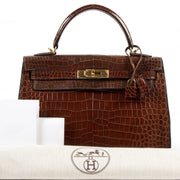 Buy and sell preloved designer vintage Hermès Kelly 32 Miel Crocodile GHW