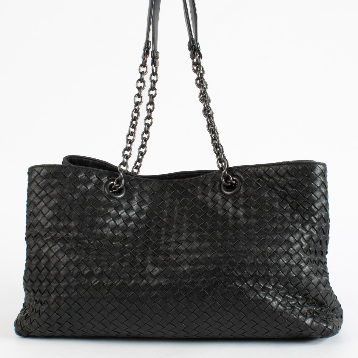 Black Bottega Veneta Intrecciato leather chain tote bag with woven design and spacious interior.