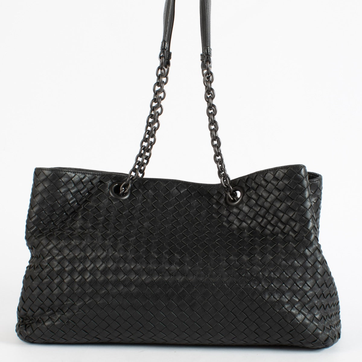 Black Bottega Veneta Intrecciato leather chain tote bag with woven design and spacious interior.