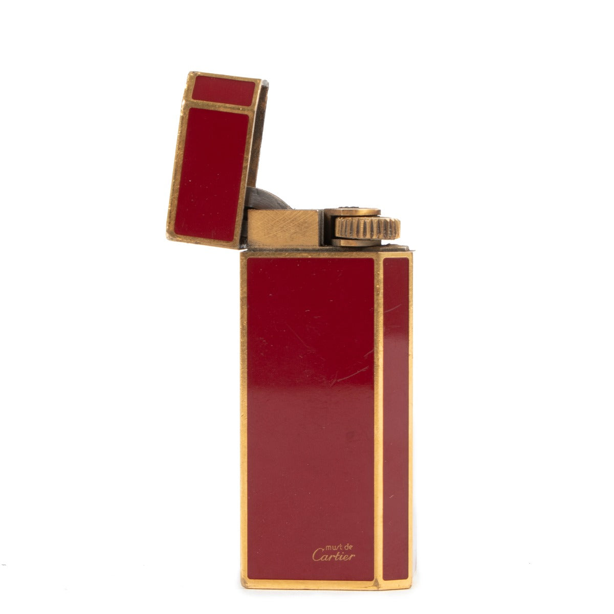 Buy online an authentic second hand Cartier Red Lacquer Gold-Plated Vintage Lighter in good condition at Labellov in Antwerp.