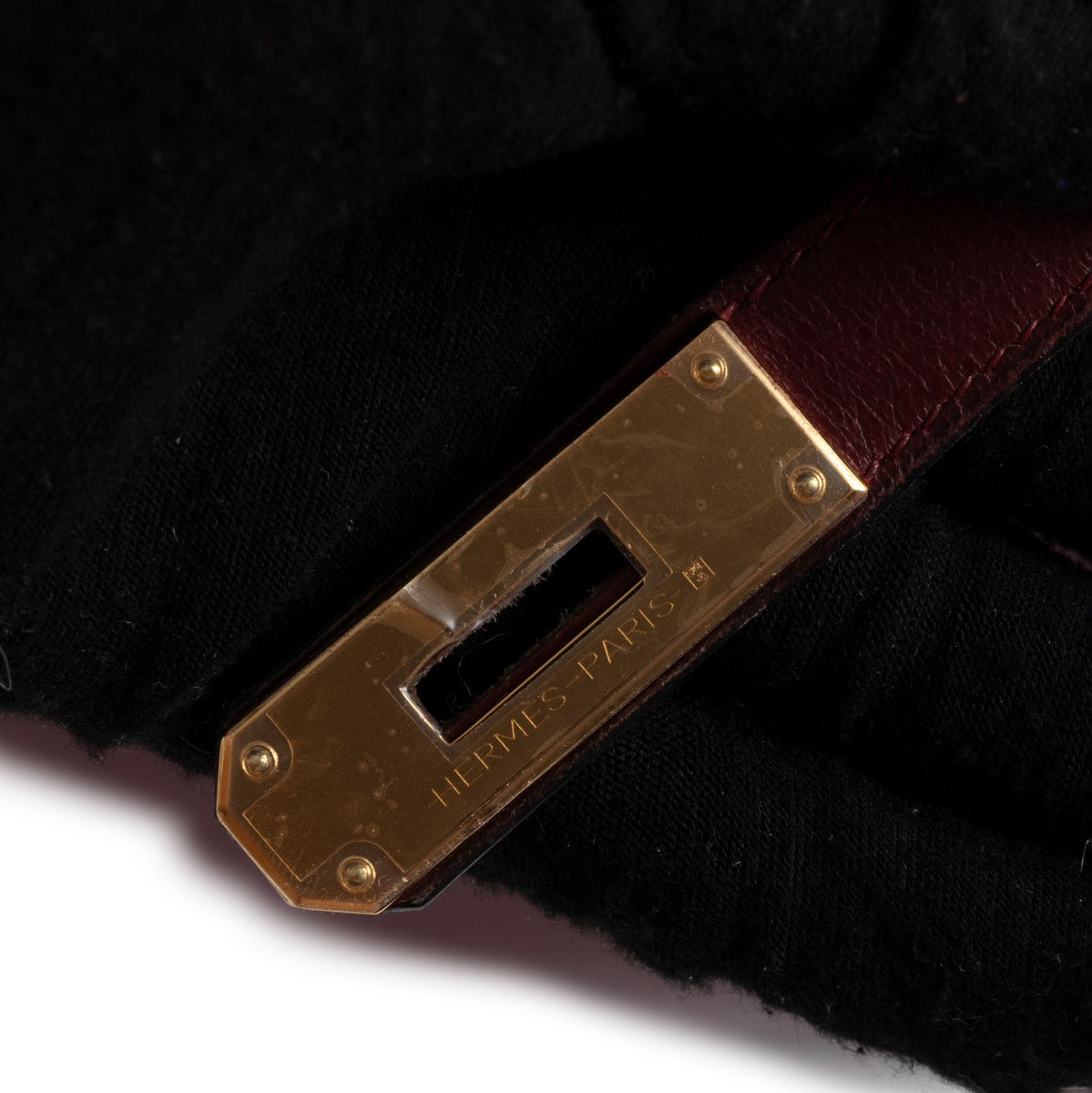 Shop authentic second hand Hermès Vintage Kelly 32 Burgundy Box Gold Hardware at Labellov