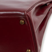 Shop authentic second hand Hermès Vintage Kelly 32 Burgundy Box Gold Hardware at Labellov