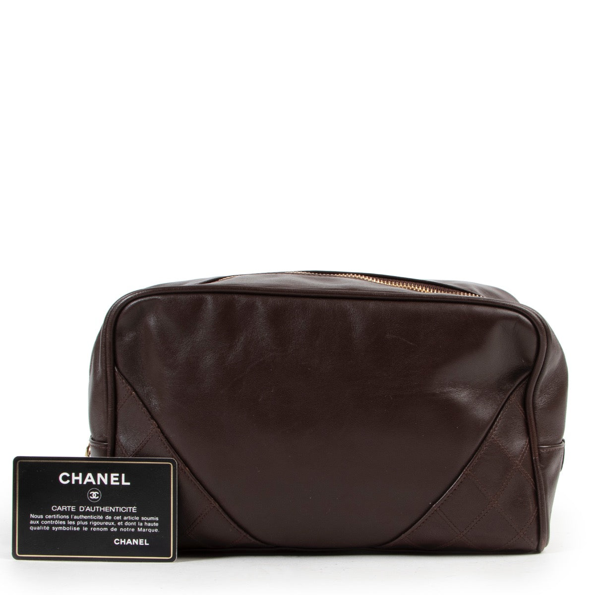 Vintage designer brown leather travel case by Chanel in good condition by Labellov luxury