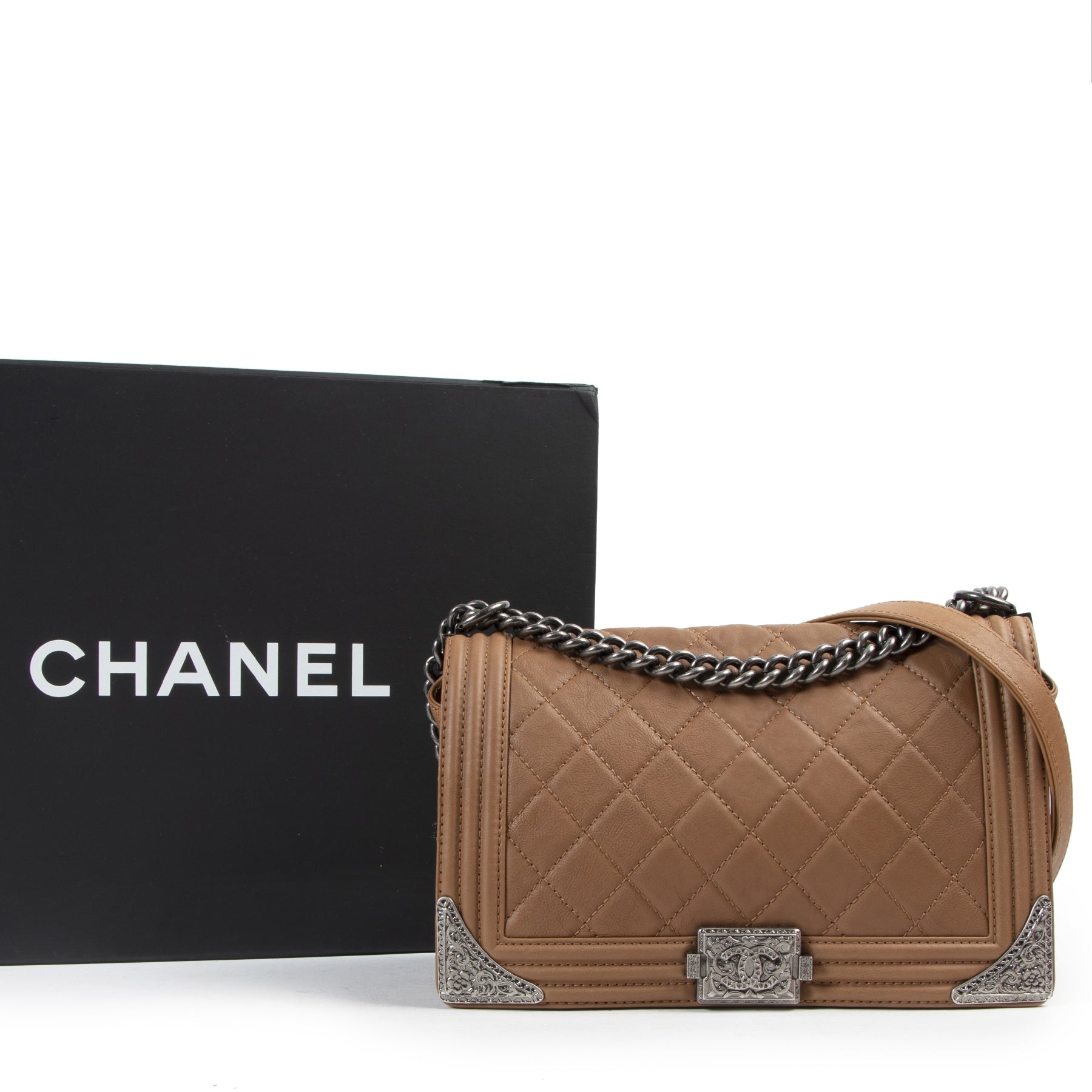 Are you looking for an authentic designer Chanel Tan Paris Dallas Metiers D'art Western New Medium Boy Bag?