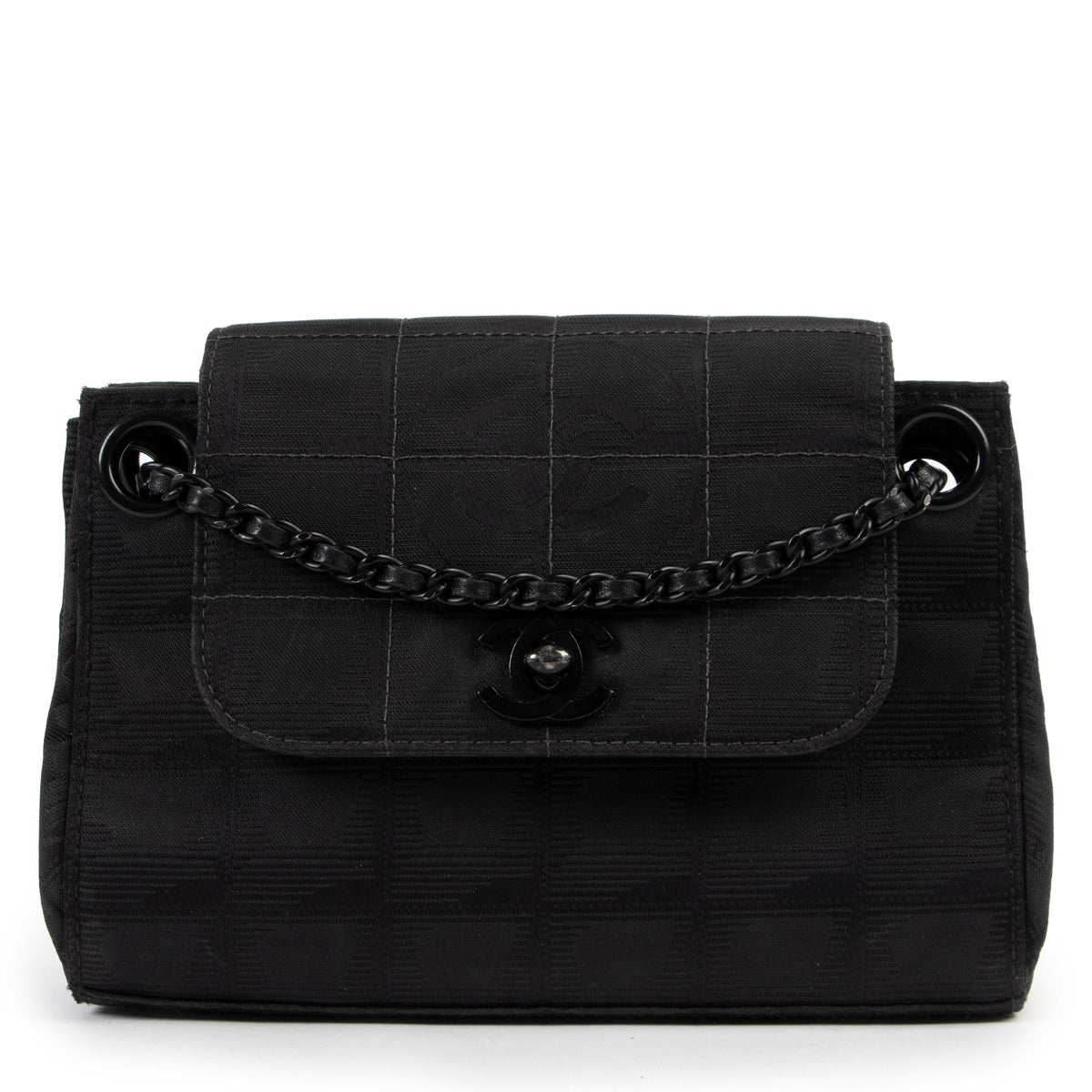 Shop authentic luxury designer vintage Chanel Black CC Travel Line Vintage Nylon Mini Shoulder Bag at Labellov for the best price.