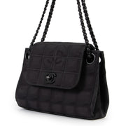 Shop authentic luxury designer vintage Chanel Black CC Travel Line Vintage Nylon Mini Shoulder Bag at Labellov for the best price.