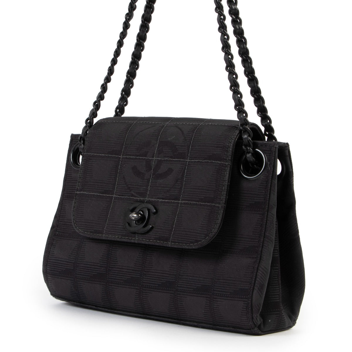 Shop authentic luxury designer vintage Chanel Black CC Travel Line Vintage Nylon Mini Shoulder Bag at Labellov for the best price.