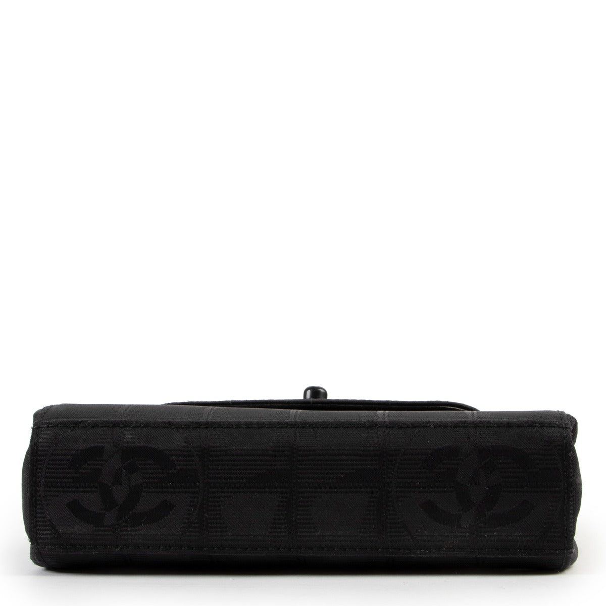 Shop authentic luxury designer vintage Chanel Black CC Travel Line Vintage Nylon Mini Shoulder Bag at Labellov for the best price.