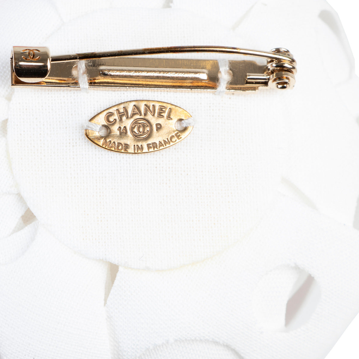 Broche Chanel fleur blanche avec perle
