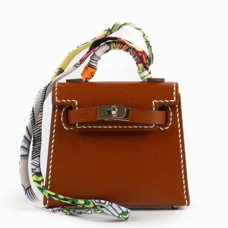 Hermès Kelly Twilly Charm Fauve Tadelakt PHW
