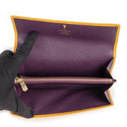 Shop safe online at Labellov in Antwerp this 100% authentic second hand Louis Vuitton Yellow Epi Porte Tresor Wallet