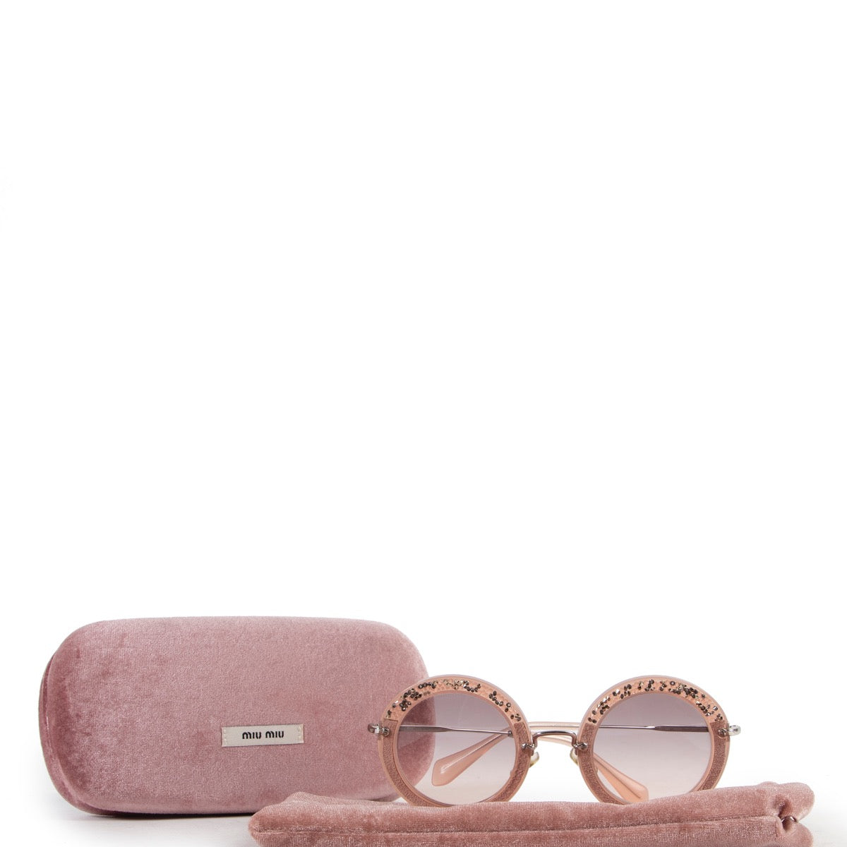 Shop safe online 100% authentic second hand Miu Miu Pink Sunglasses in very good condition at Labellov in Antwerp.