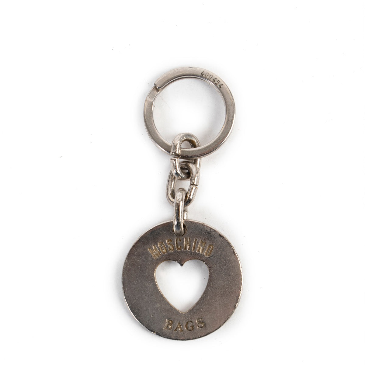 Moschino Silver Keychain available to buy online or in store at Labellov. Give your items a second life and bring them in at Labellov or sell your items.