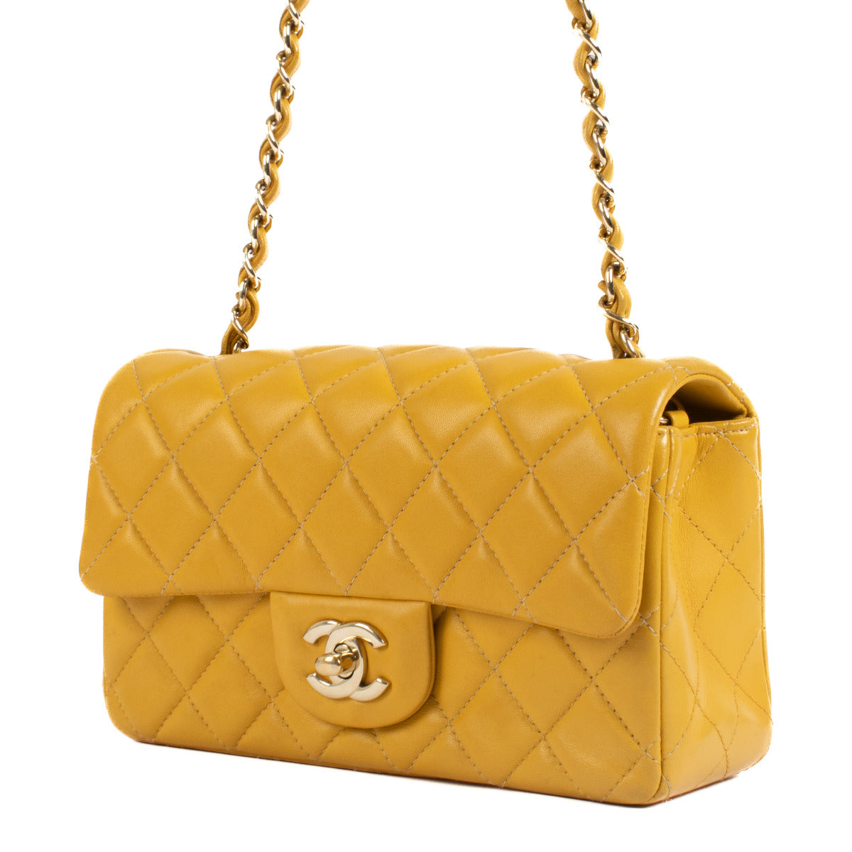 Chanel Sunflower Yellow New Mini Classic Flap Bag aan de beste prijs bij Labellov tweedehands designer luxe in Antwerpen.