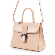 Achetez en ligne second main ce sac Delvaux Brilliant MM nude rose en très bon état.